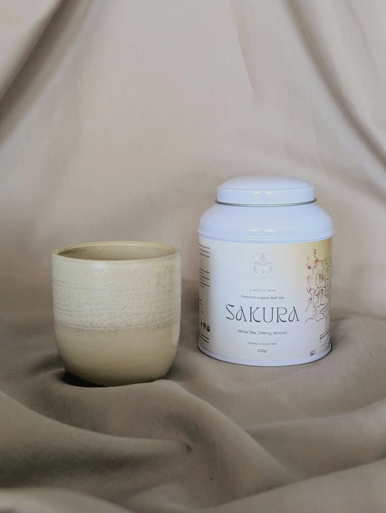 Erinora customizable Artisan gift box containing organic loose-leaf tea tin and handmade stoneware cup