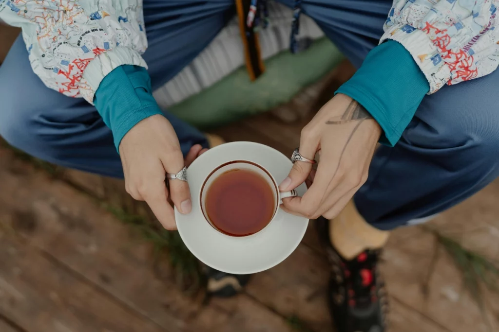 Person holding a cup