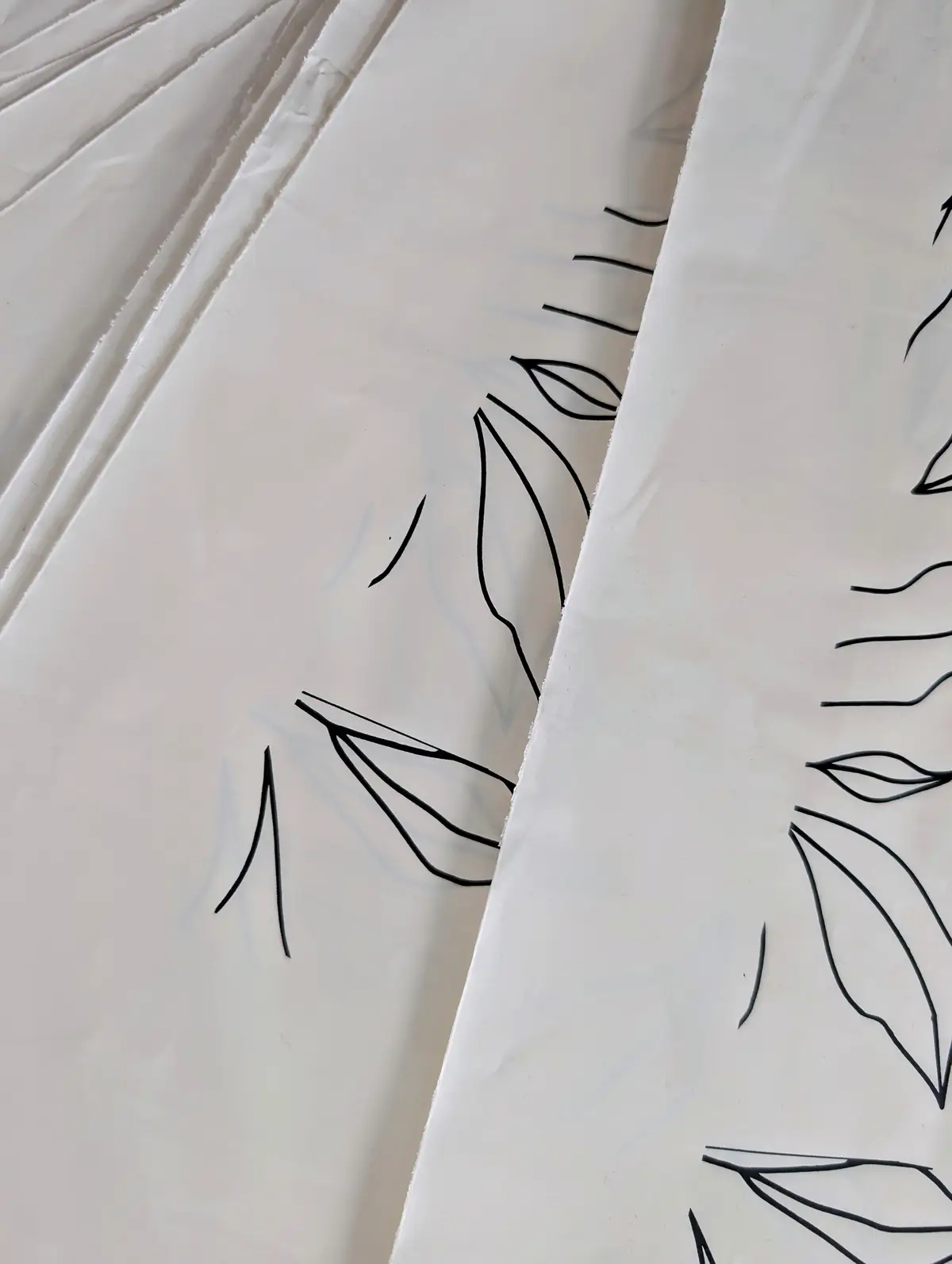 Eco-friendly shipping bags decorated with botanical leaf illustrations