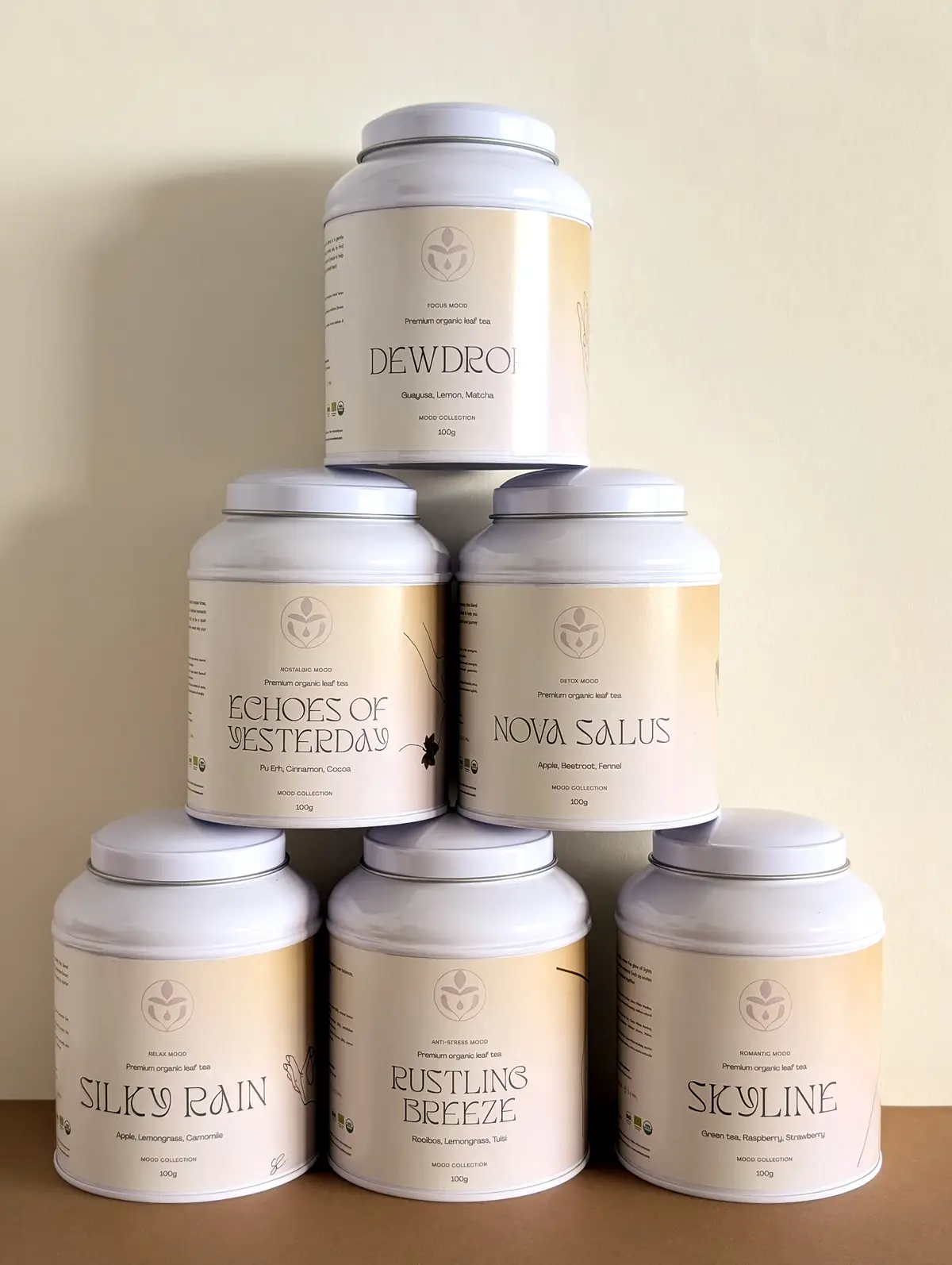 Stack of eco-friendly Erinora tea tins for loose leaf tea in sustainable packaging